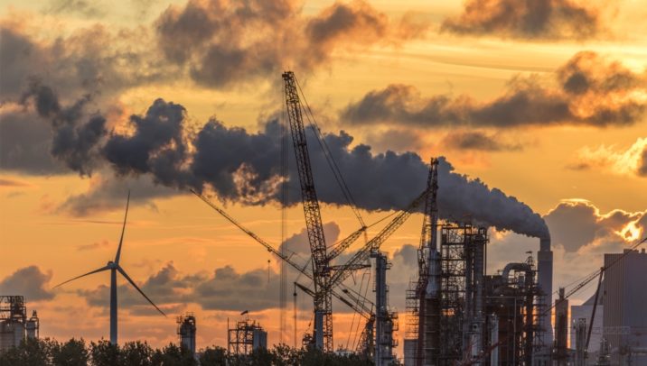Fossil-fuels.jpg Smoking chimneys against sunset